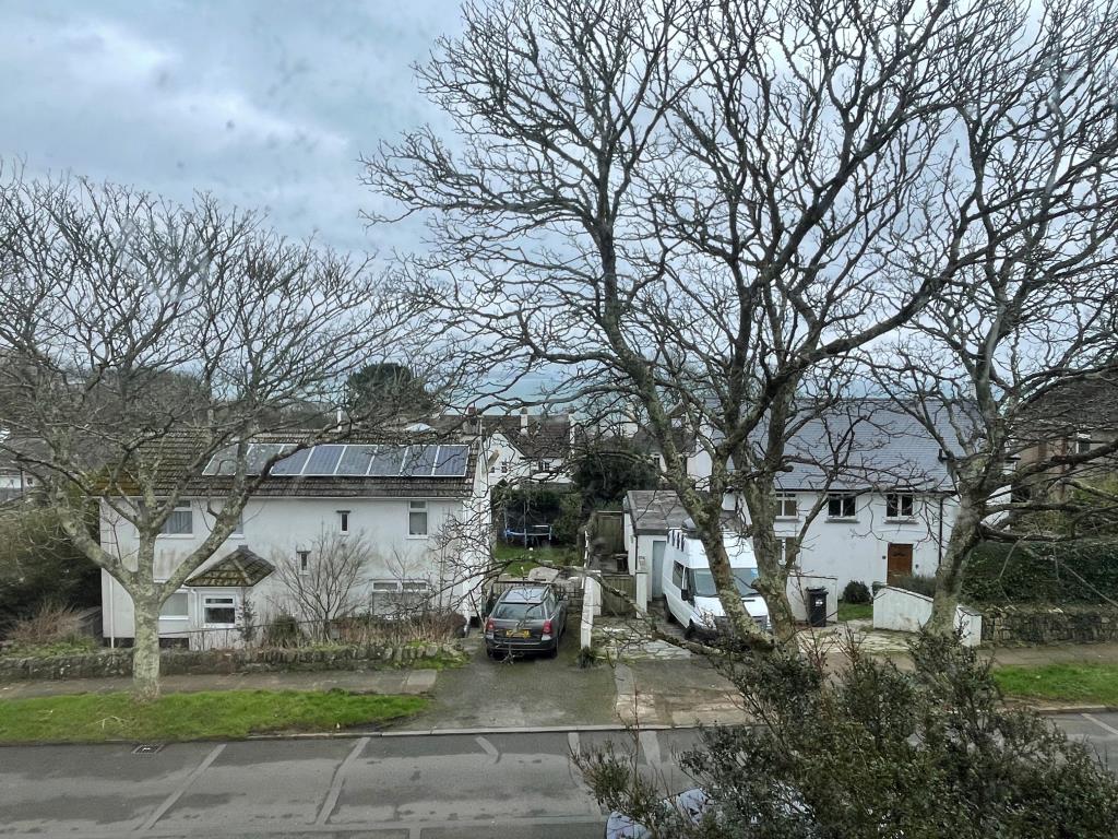 Lot: 12 - FREEHOLD HOUSE FOR IMPROVEMENT - View from first floor bedroom with sea glimpses